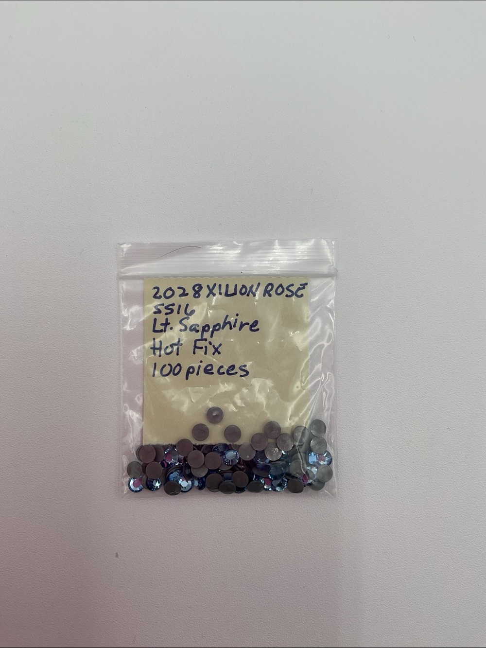 Swarovski • Color: Light Sapphire, 2028 XILION Rose Hotfix Rhinestones